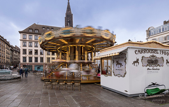 Strasbourg France: Merry go round at Place Gutenberg