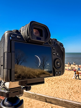 April: I-Phone- Eclipse reflection In camera- Indiana Dunes National Park