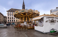 Strasbourg France: Merry go round at Place Gutenberg