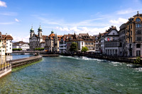 Lucerne: Image taken from Spreuerbrucke 15th certury covered pedestrian bridge looking east toward Jesuitenkirche the 17th certury baroque church w/ dual towers